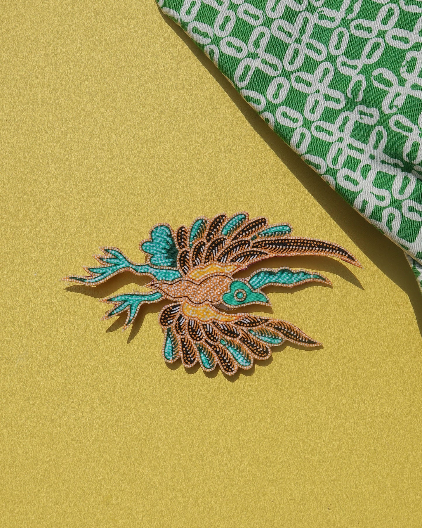 Mergastua Batik Brooch