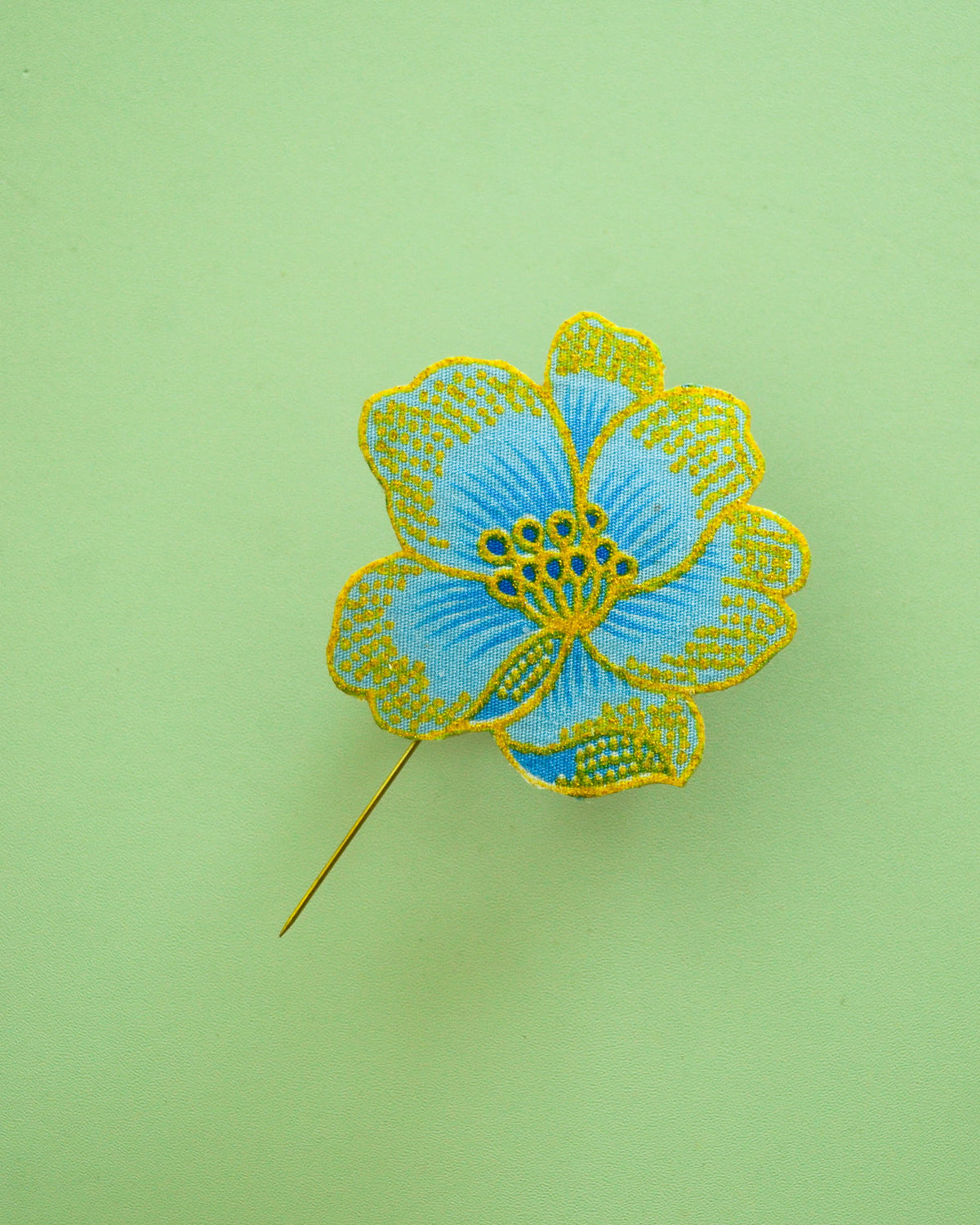 Nira Batik Lapel Pin